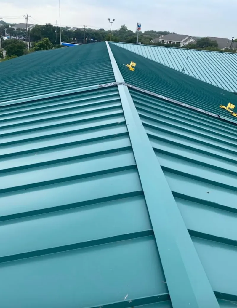 Green commercial metal roof ridge and valley for Metal Roof Repair in Neptune Beach